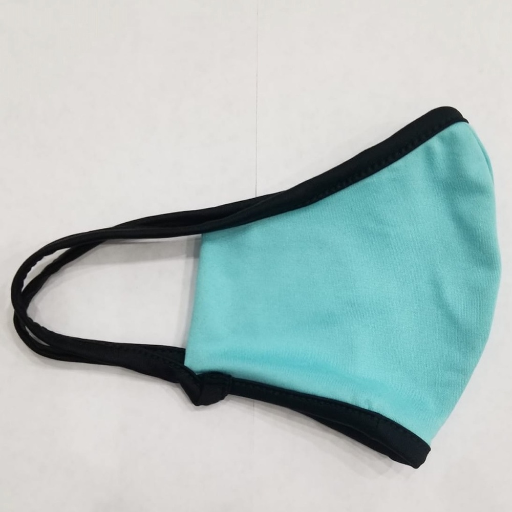Cute Bright turquoise mask brand new